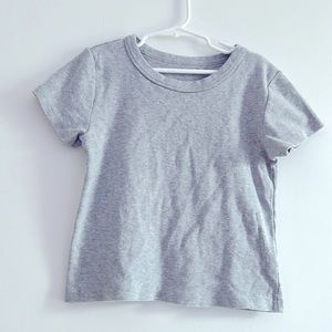 This is a gray cropped Brandy Melville top!